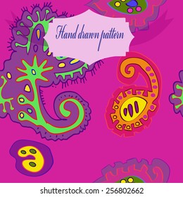 Seamless pattern of colored floral motifs, label on a  pink  background. Hand drawn.