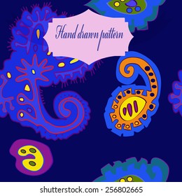 Seamless pattern of colored floral motifs, label on a dark blue   background. Hand drawn.
