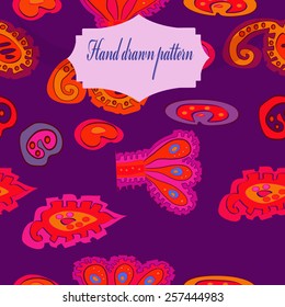 Seamless pattern of colored floral motifs, label on a dark pink    background. Hand drawn.