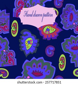 Seamless pattern of colored floral motifs, label on a  dark blue  background. Hand drawn. 