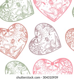 Seamless pattern with colored hearts in the style of doodle.