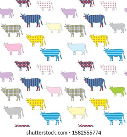 Seamless pattern with the colored image of silhouettes of cows with geometrical patterns