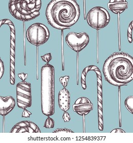 Seamless pattern with colored lollipop, candies hand drawn illustration
