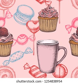 Seamless pattern with colored lollipop, macaron, candies, cupcakes, tea cup