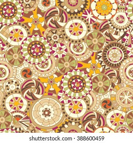 Seamless pattern of colored mandalas, vector graphics.