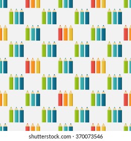 Seamless pattern of colored pencils on a beautiful background