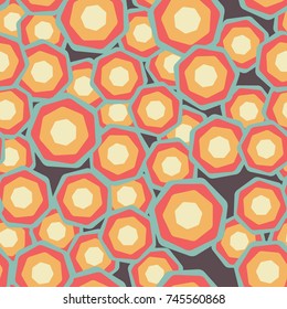 A seamless pattern of colored rounded heptagons.