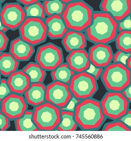 A seamless pattern of colored rounded heptagons.