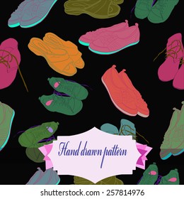 Seamless pattern of colored shoe, label on a black     background. Hand drawn.