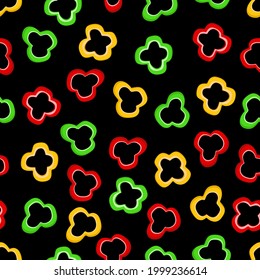 Seamless pattern of colored sweet pepper slices on a black background. Vector illustration of vegetables