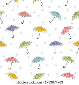 Seamless pattern and colored umbrellas   rain drops  Vector illustration
