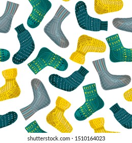 Seamless pattern of colored warm clothes with ornament. Set knitted socks in vector for fashion magazines and shops. Endless illustration for wrappers and backgrounds isolated on white.