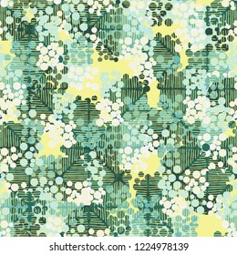 Seamless pattern. Colorful abstract urban camouflage. For children and women. Casually shaded squares. Editing is available.