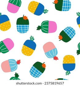 Patrón sin foco con bellotas coloridas. Huella natural. Ilustración dibujada a mano por vectores.