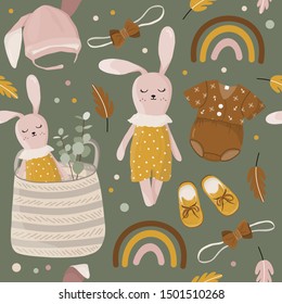 Seamless pattern of colorful autumn kids clothes, toys, room decor, leaves in brown and pink colors.