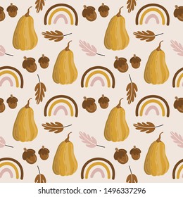 Seamless pattern of colorful autumn leaves, pumpkins, rainbow and acorn on bright background.