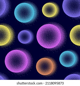 Seamless pattern with colorful balls on dark background.