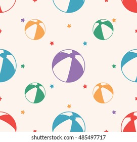 Seamless pattern with colorful beach balls on beige background. Baby pattern.