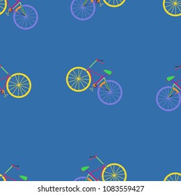Seamless pattern from colorful bicycles on a blue background