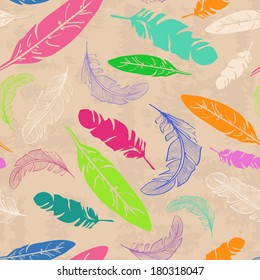 Seamless pattern of colorful bird feathers