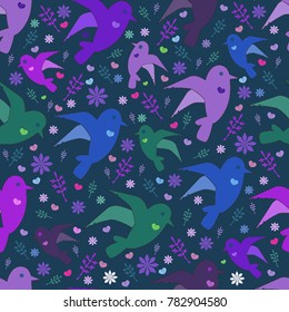 Seamless pattern of colorful birds, flowers and hearts on a dark blue background
