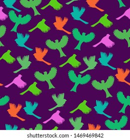Seamless pattern with colorful birds. Vector graphics.