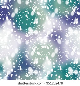 Seamless pattern with colorful blur background and realistic snow overlay.  Background tile for winter holidays. Abstract texture template.