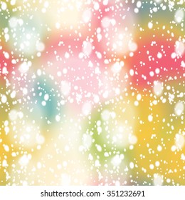 Seamless pattern with colorful blur background and realistic snow overlay.  Background tile for winter holidays. Abstract texture template.