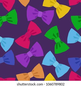 Seamless pattern of colorful bow tie on a blue background