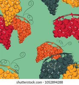 Seamless pattern with colorful bunches of grapes on a faded blue background. Vector illustration