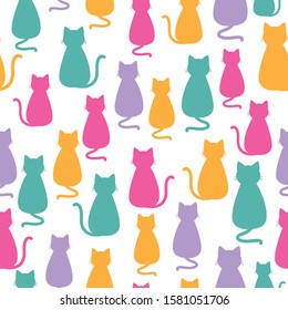 Seamless pattern of colorful cats on white background
