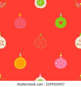 Seamless pattern with colorful Christmas balls. Holiday wrapping paper or background.