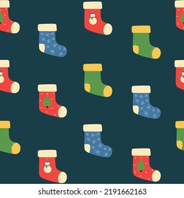 Seamless pattern of colorful Christmas socks on dark blue background. Doodle style. Christmas winter background. Vector illustration