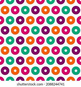 Patrón sin brillo con círculos coloridos. Diseño de tejidos, tejidos, papel pintado, ropa de cama, chándales o prendas de vestir neutras desde el punto de vista del género.