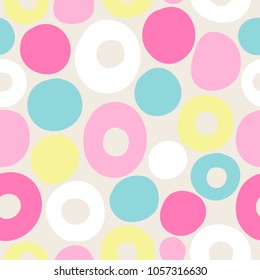 Seamless pattern with colorful circles in pastel colors. Perfect for wallpaper, gift paper, holiday greeting cards