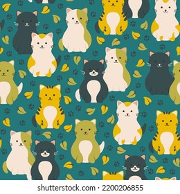 Seamless pattern with colorful cute cats and autumn leaves. Vector illustration.