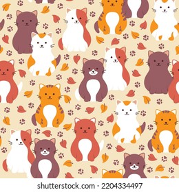 Nahtloses Muster mit bunten, süßen Katzen und Herbstblättern. Vektorgrafik.