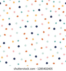 Seamless pattern with colorful dots. Confetti holiday print. Vector hand drawn illustration. 
