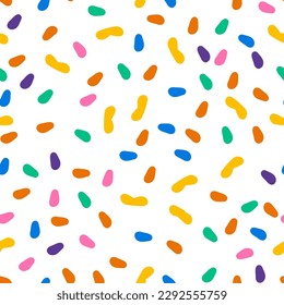 Seamless pattern with colorful dots sprinkles. Childish doodle print with confetti. Fun abstract scribble donut glaze background. Vector illustration