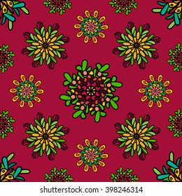 Seamless pattern with colorful drawn mandala flowers