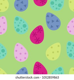 Seamless pattern of colorful Easter eggs on a green background