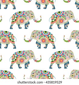 Seamless pattern of colorful elephants decorated mandala ornament