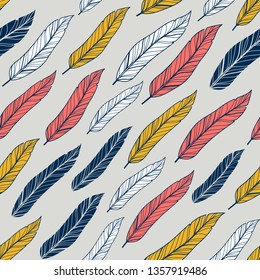 Seamless pattern with colorful feathers from birds. Vector endless illustration for fabric, wallpaper and prints.