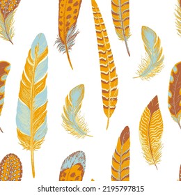 Seamless pattern of colorful feathers. Yellow, blue, brown colors. Brush and paint texture. Vector illustration