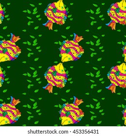 Seamless pattern with colorful fish on green background. Vector illustration.