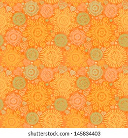 Seamless pattern with colorful flowers and hearts. Bright autumn background. It can be used for wallpaper, pattern fills, web page background, surface textures.
