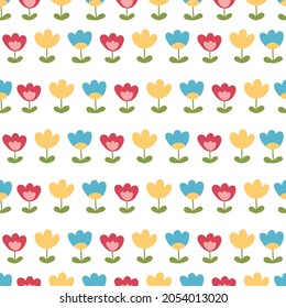Seamless pattern with colorful flowers on white background. Hand drawn simple plants. Spring vector illustration for textile, wallpapers, wrapping papers and fabrics prints.