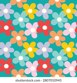 seamless pattern of colorful flowers in shades of yellow, red, pink, and blue set against a teal background for fabric, wallpaper, or graphic design projects.