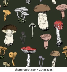 Seamless pattern with colorful forest mushrooms on green background