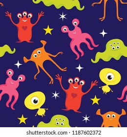 Seamless pattern with colorful funny monsters on dark blue background. Vector illustration with cute characters in cartoon flat style.